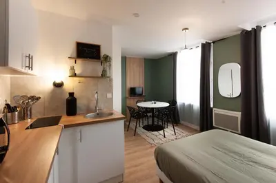 Cuisine ou kitchenette dans l'établissement L'escapade studio en Hypercentre Cathédrale