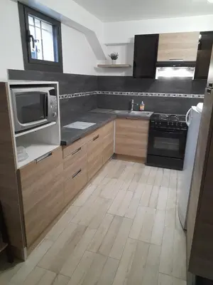 Cuisine ou kitchenette dans l'établissement Gite au Reflet d'Auvers