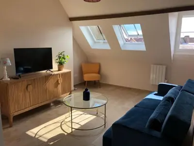 Télévision ou salle de divertissement dans l'établissement Appartement F2