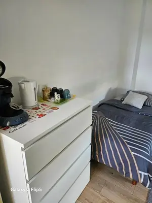 Un ou plusieurs lits dans un hébergement de l'établissement Magnifique Chambre Triple3