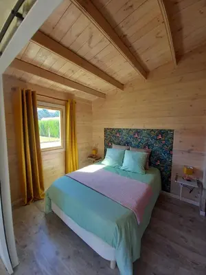Un ou plusieurs lits dans un hébergement de l'établissement Cottage Maupassant
