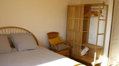 Un ou plusieurs lits dans un hébergement de l'établissement Appartement Chez Caroline