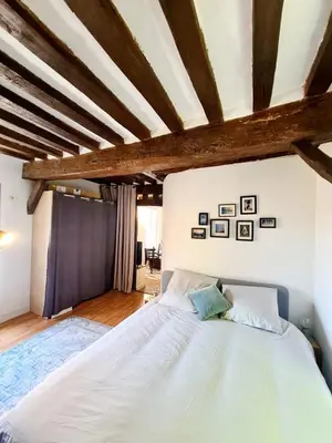 Un ou plusieurs lits dans un hébergement de l'établissement Beau 2 pièces charme et confort