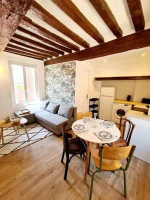 Coin salon dans l'établissement Beau 2 pièces charme et confort