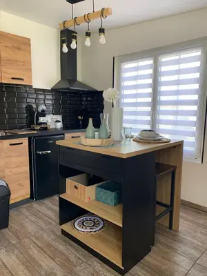 Cuisine ou kitchenette dans l'établissement La Pause Cosy