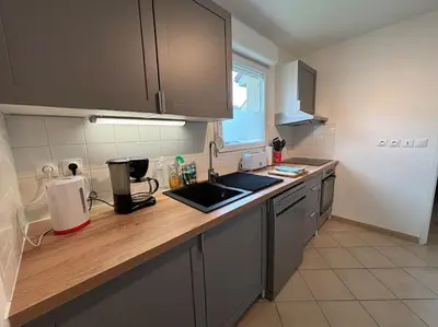 Cuisine ou kitchenette dans l'établissement Le havre de Chloé en baie de Somme