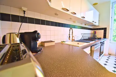 Cuisine ou kitchenette dans l'établissement Évasion au Château Ravenel