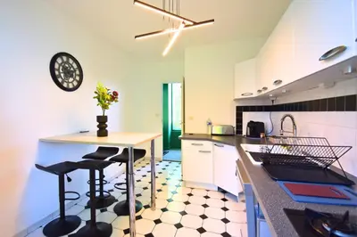 Cuisine ou kitchenette dans l'établissement Évasion au Château Ravenel