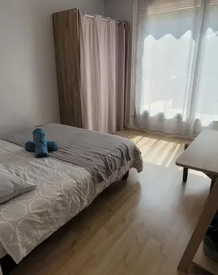 Un ou plusieurs lits dans un hébergement de l'établissement Grand appartement 4 chambres - grande terrasse - Cergy Centre