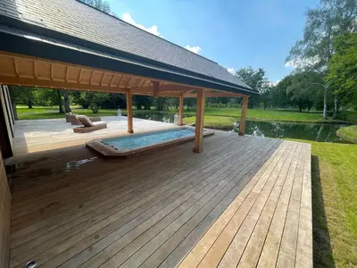 Jardin de l'établissement Suite climatisée de 120 m2 avec spa de nage, sauna et balnéo