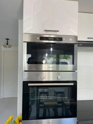 Cuisine ou kitchenette dans l'établissement Logement cosy à 15 mn de la gare saint Lazare et 30 mn de l'aéroport Charles de Gaulles