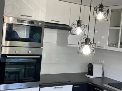 Cuisine ou kitchenette dans l'établissement Logement cosy à 15 mn de la gare saint Lazare et 30 mn de l'aéroport Charles de Gaulles
