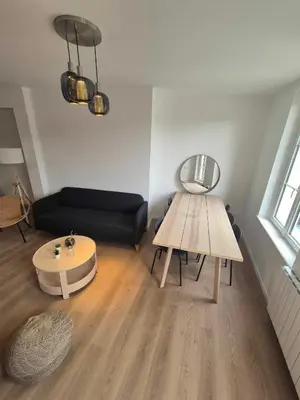 Coin salon dans l'établissement Maison Les 4 Mers
