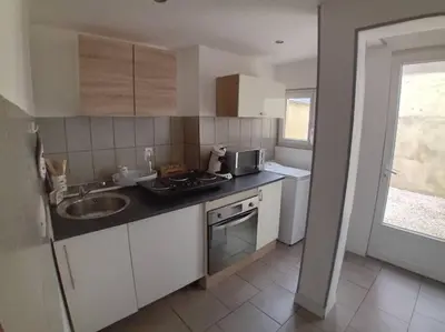 Cuisine ou kitchenette dans l'établissement Maison à Eu proche centre ville et baie de Somme