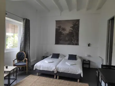 Un ou plusieurs lits dans un hébergement de l'établissement Cosy Campagne