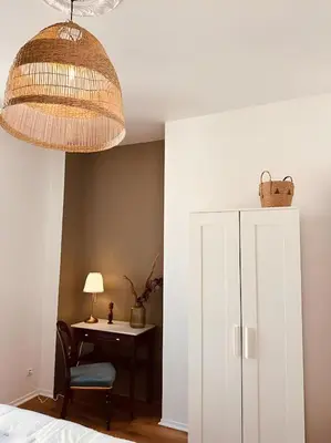 Un ou plusieurs lits dans un hébergement de l'établissement St Croix Appartement style Haussmannien lumineux 