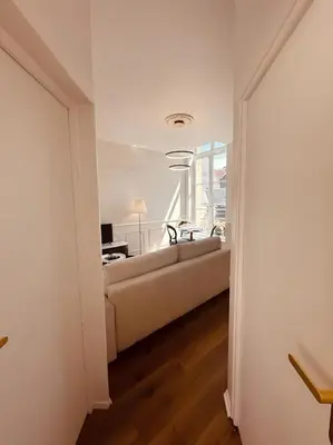 Un ou plusieurs lits dans un hébergement de l'établissement St Croix Appartement style Haussmannien lumineux 