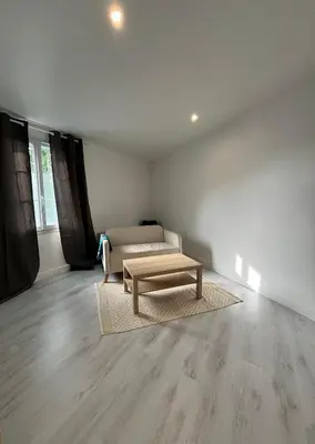 Coin salon dans l'établissement Maison à Mantes la jolie