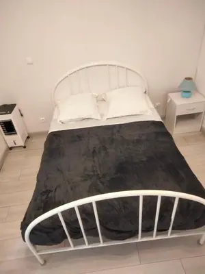 Un ou plusieurs lits dans un hébergement de l'établissement Appartement meublé neuf, près de Paris et Beauvais