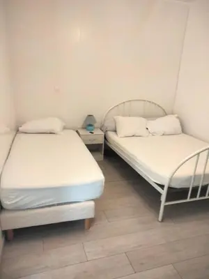 Un ou plusieurs lits dans un hébergement de l'établissement Appartement meublé neuf, près de Paris et Beauvais