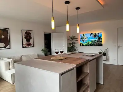 Télévision ou salle de divertissement dans l'établissement Appartement 52m2, neuf, à deux pas de la Gare