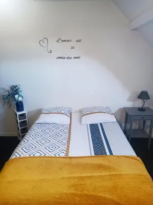 Un ou plusieurs lits dans un hébergement de l'établissement maison 2 chambres 4 lits 15mn Aéroport de Beauvais 5mn du château de la trye