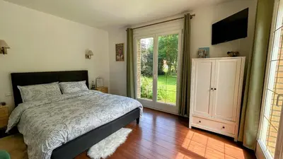 Un ou plusieurs lits dans un hébergement de l'établissement Cottage de Flesselles