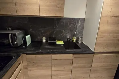 Cuisine ou kitchenette dans l'établissement F2 en centre ville proche gare