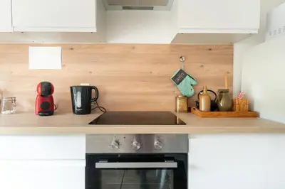 Cuisine ou kitchenette dans l'établissement Le comble du bonheur