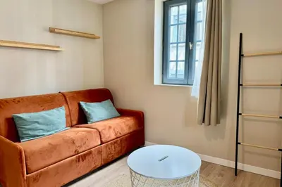 Coin salon dans l'établissement Julia un véritable cocon au coeur de la ville