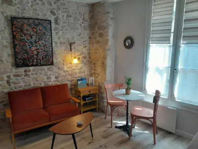Coin salon dans l'établissement Gite La folie de Séraphine