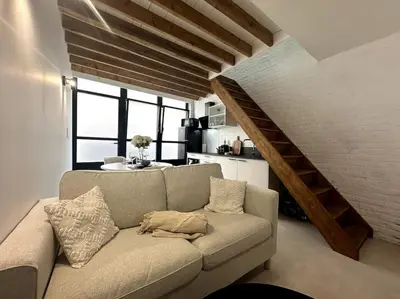 Coin salon dans l'établissement Gare Unique Duplex lumineux