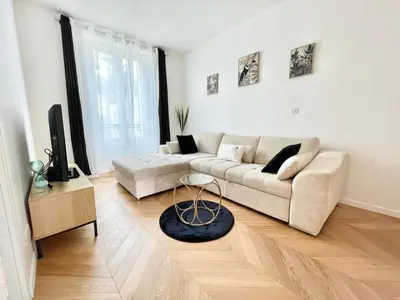 Coin salon dans l'établissement Appart Cosy Proche gare