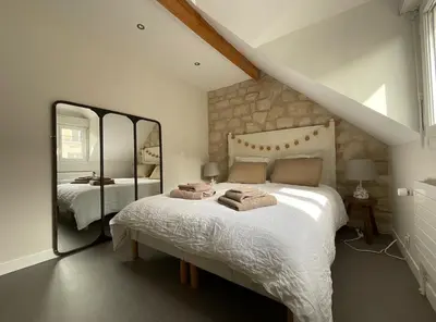 Un ou plusieurs lits dans un hébergement de l'établissement Chambres d'hôtes à 30 min de Paris