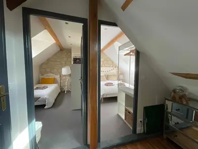 Un ou plusieurs lits dans un hébergement de l'établissement Chambres d'hôtes à 30 min de Paris