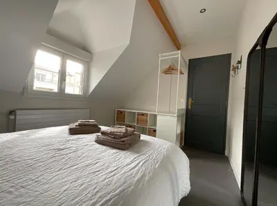 Un ou plusieurs lits dans un hébergement de l'établissement Chambres d'hôtes à 30 min de Paris