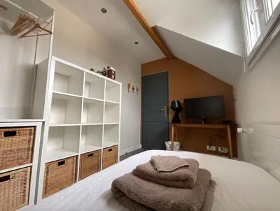 Un ou plusieurs lits dans un hébergement de l'établissement Chambres d'hôtes à 30 min de Paris