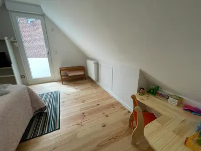Coin salon dans l'établissement Maison moderne à Ancourt avec parking privé