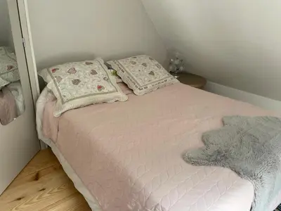 Un ou plusieurs lits dans un hébergement de l'établissement Maison moderne à Ancourt avec parking privé