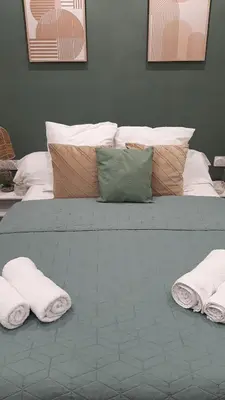 Un ou plusieurs lits dans un hébergement de l'établissement Chic Cocon in Rouen