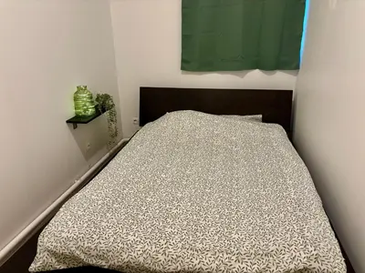 Un ou plusieurs lits dans un hébergement de l'établissement Appartement calme et cosy - Proche centre