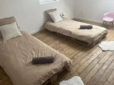 Un ou plusieurs lits dans un hébergement de l'établissement Ferme Cosy et Paisible au Bord de l'Eure