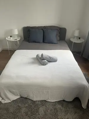 Un ou plusieurs lits dans un hébergement de l'établissement Ferme Cosy et Paisible au Bord de l'Eure