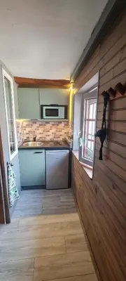 Cuisine ou kitchenette dans l'établissement Micro studio vitaminé