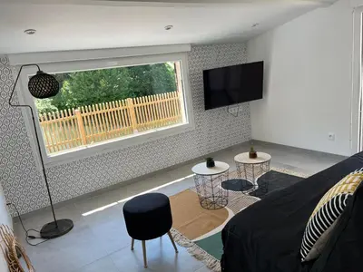Télévision ou salle de divertissement dans l'établissement Eau gîte