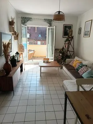 Coin salon dans l'établissement Cosy flat in Beauvais city center