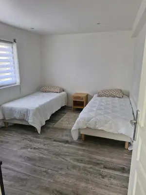 Un ou plusieurs lits dans un hébergement de l'établissement Maison Eden à 400 m de l'aéroport