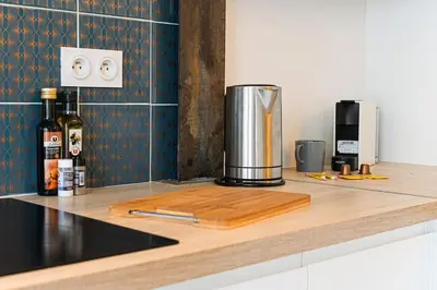 Cuisine ou kitchenette dans l'établissement Gare - La Boutique Beauvoisine