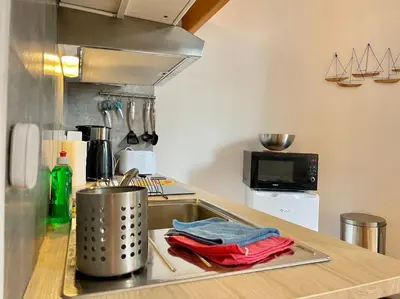 Cuisine ou kitchenette dans l'établissement Gare - Le Saint Dominique