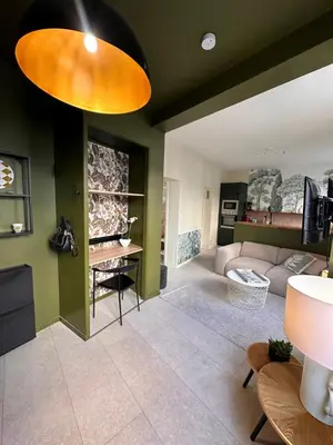 Télévision ou salle de divertissement dans l'établissement Le 101 appartement dans charmant village parking facile